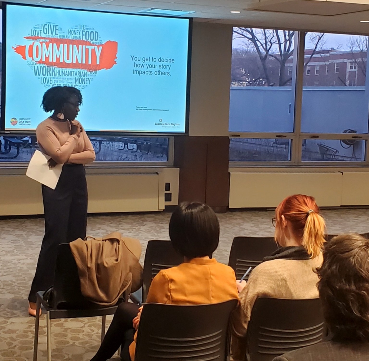 Nina Carter facilitating a community session on impact and storytelling